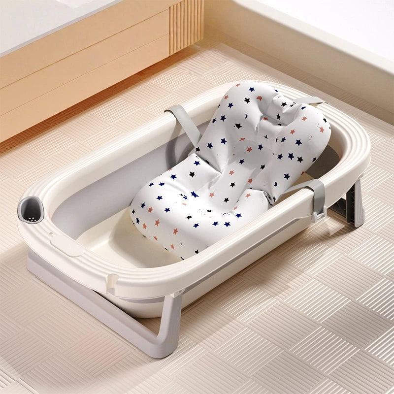 Foldable Baby Bath Tub with built-in temperature sensor by Baby Bubble, showing the tub folded and open for easy use.