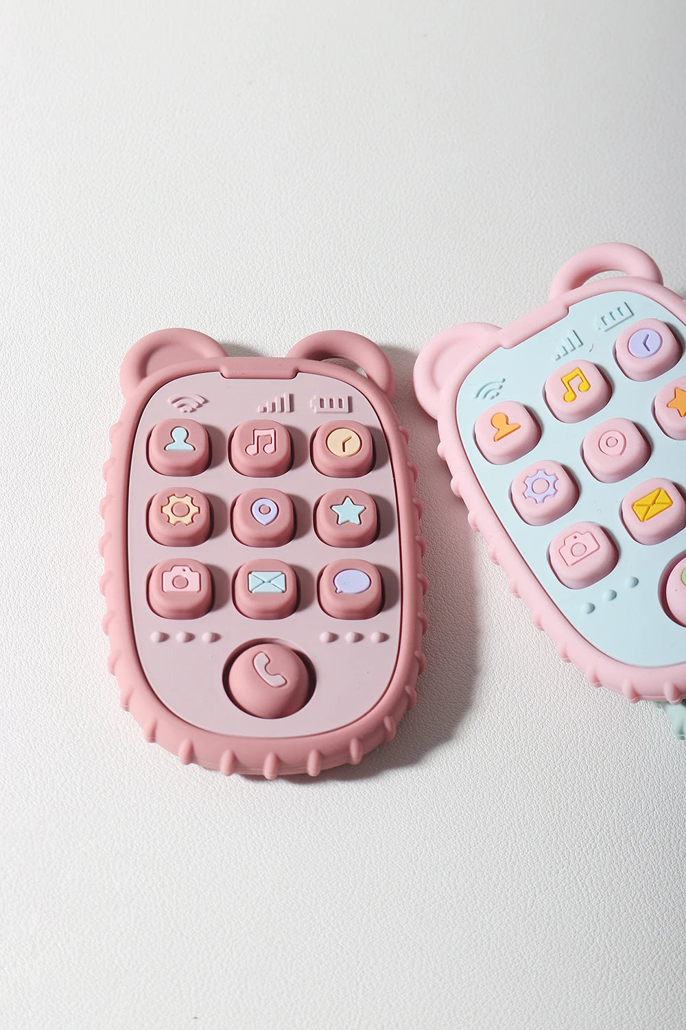 Baby Bubble Baby Phone Shape Teether made of colorful silicone, designed for soothing and chewing comfort for infants.
