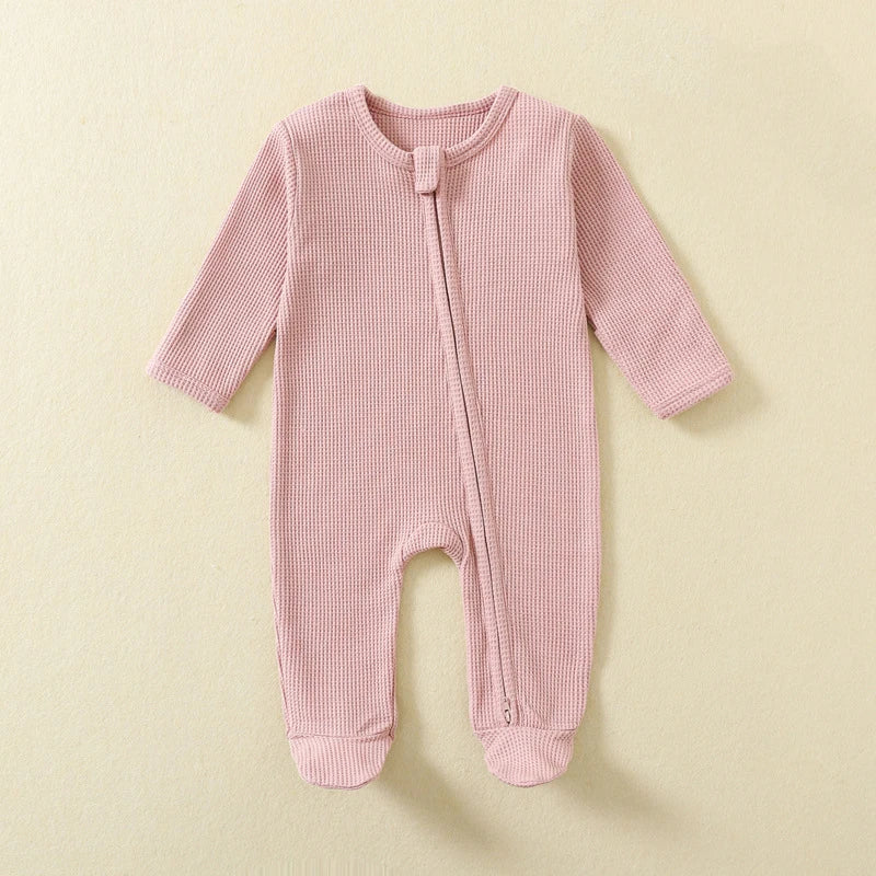 Baby Bubble organic cotton baby romper with long sleeves, zipper closure, footed design, waffle texture, suitable for boys and girls.
