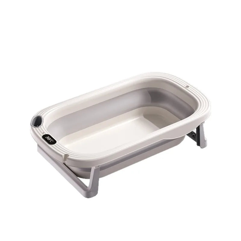 Foldable Baby Bubble bath tub with temperature sensor, lightweight and compact for easy storage and safe bathing for infants.