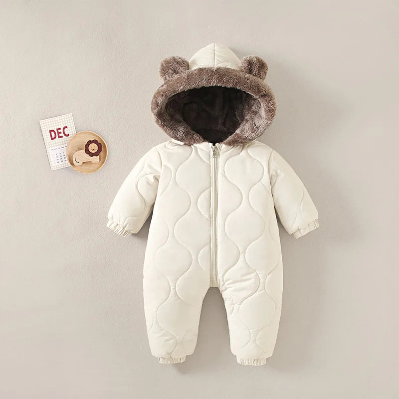 Baby Bubble baby winter jumpsuit with fur lining and cute cartoon print, designed for warmth and comfort in cold weather.