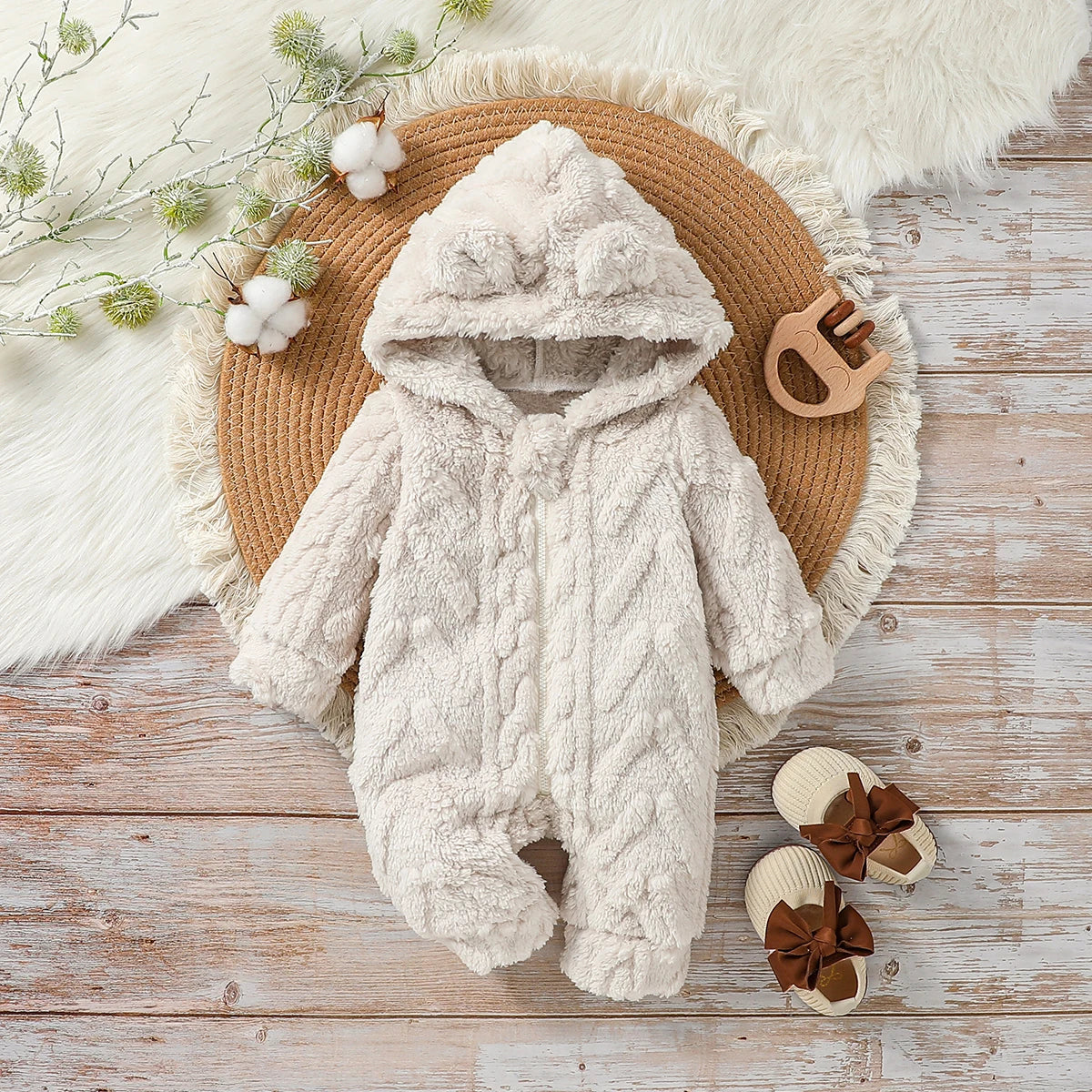 Baby Boy's winter hooded jumpsuit from Baby Bubble, featuring a warm, cozy design with a hood and full-body coverage.