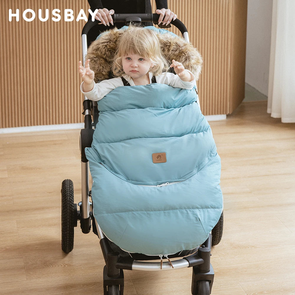 Baby Bubble winter pram sleeping bag with removable warm footmuff, soft and insulated for cozy baby stroller comfort.