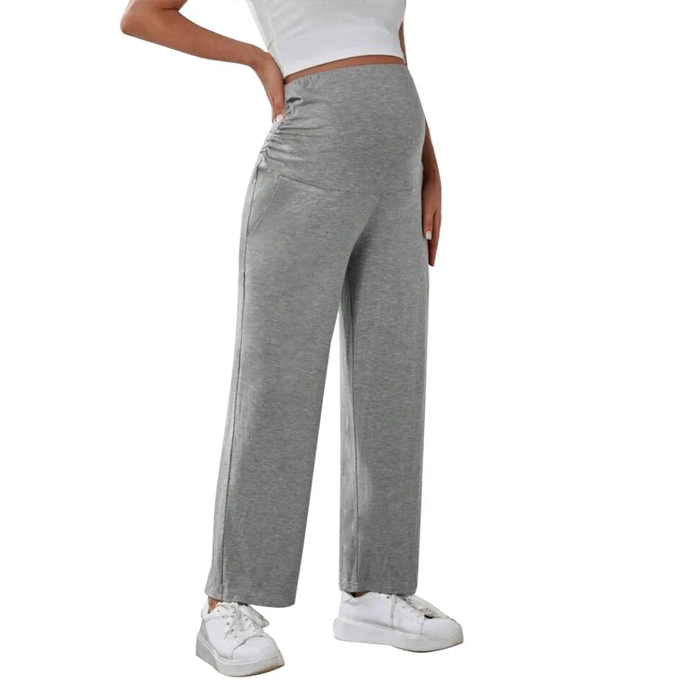 Baby Bubble maternity wide leg pants with over-belly design, soft fabric, and comfortable fit for expecting mothers, shown on a model.