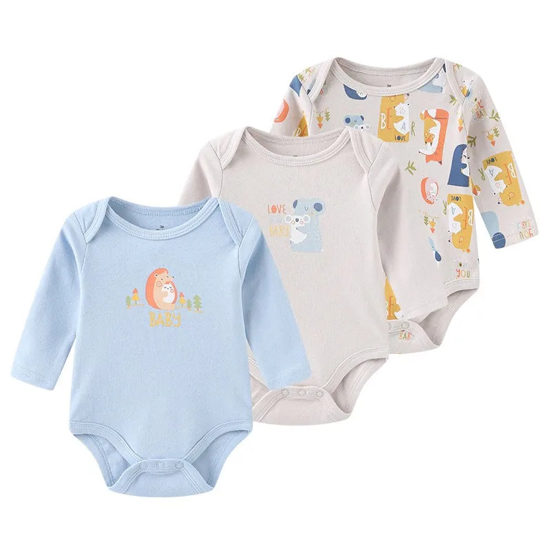 Set of three Baby Bubble newborn cotton bodysuits with soft, comfortable fabric, ideal for everyday wear for infants.