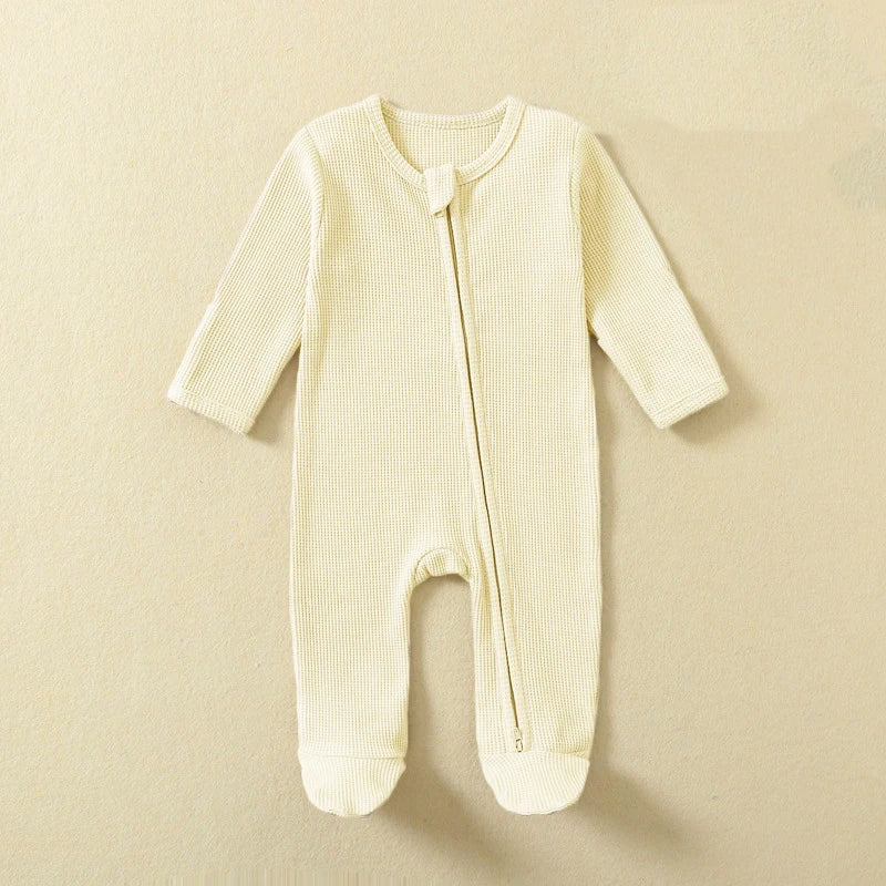 Organic cotton baby romper by Baby Bubble, long-sleeve footed jumpsuit with zipper, waffle texture for infants boys and girls.