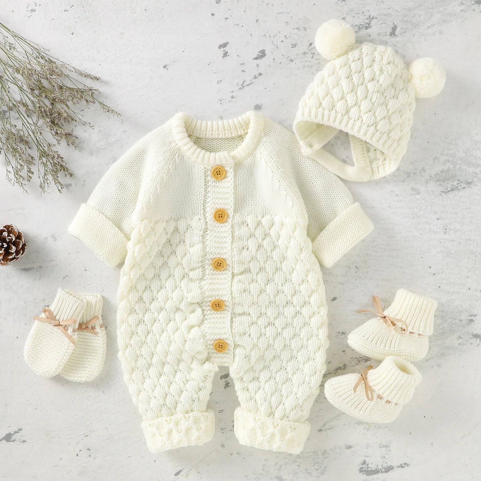 Baby Bubble knitted romper and cap set for autumn and winter, featuring cozy, soft knit fabric and cute design for infants.