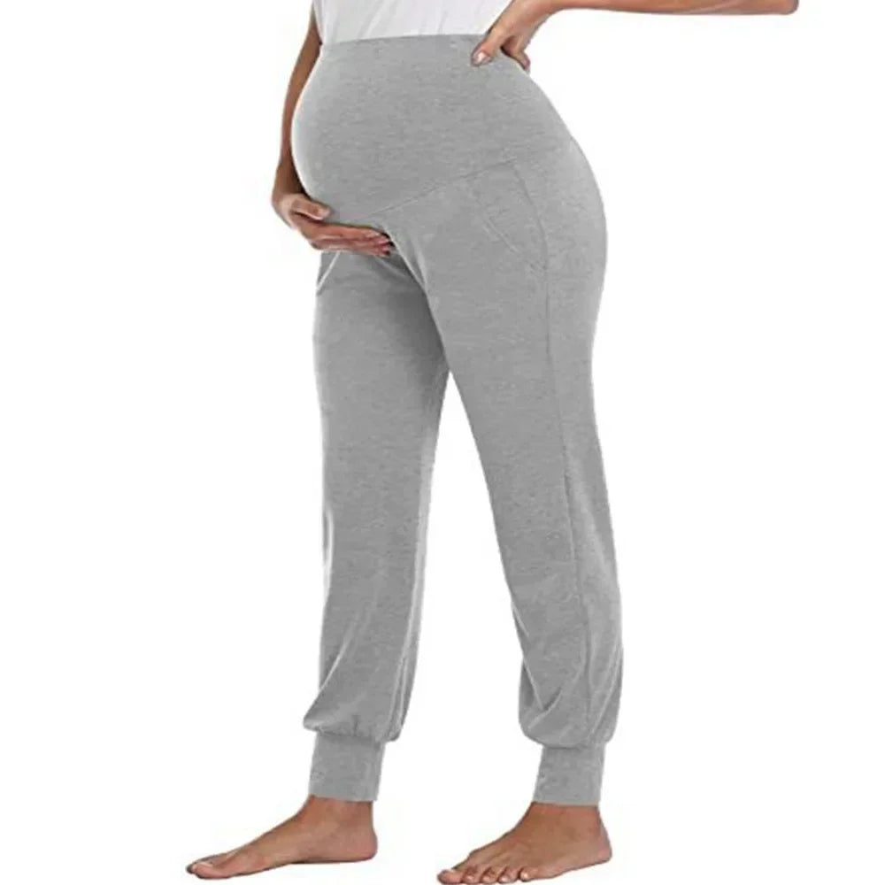 Soft high waist maternity jogger pants by Baby Bubble, featuring comfortable fit and relaxed style for expecting mothers.