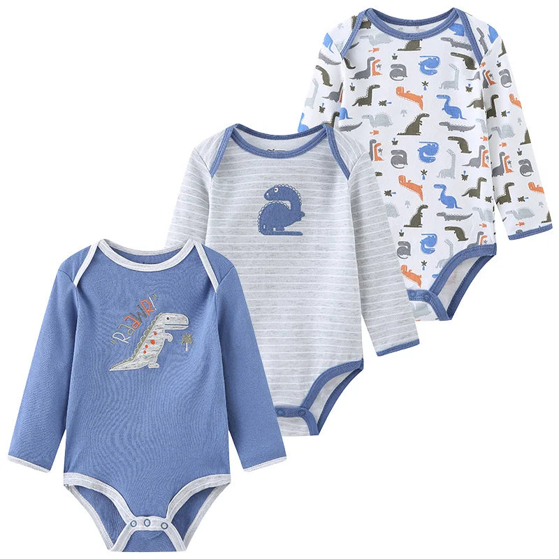 Three soft newborn cotton bodysuits from Baby Bubble, featuring colorful designs and snap closures for easy dressing.