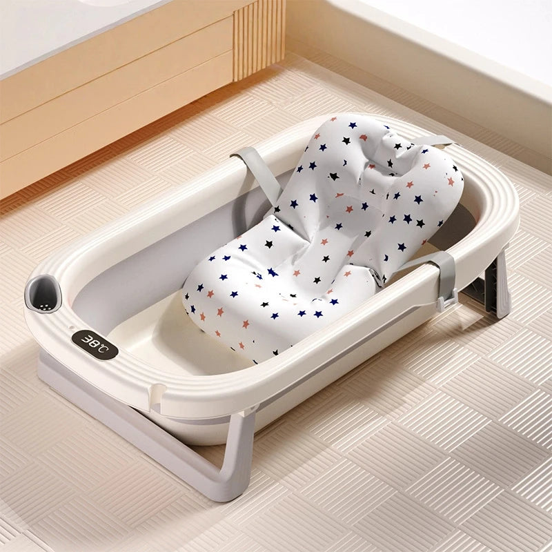 Foldable Baby Bath Tub with built-in temperature sensor by Baby Bubble, showing the compact, foldable design and safety features.