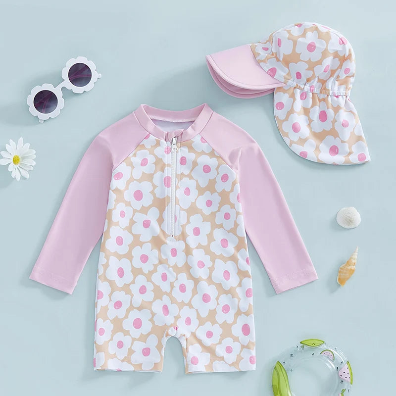 Baby girls rash guard set with floral and flamingo print by Baby Bubble, featuring colorful swimwear for sun protection.