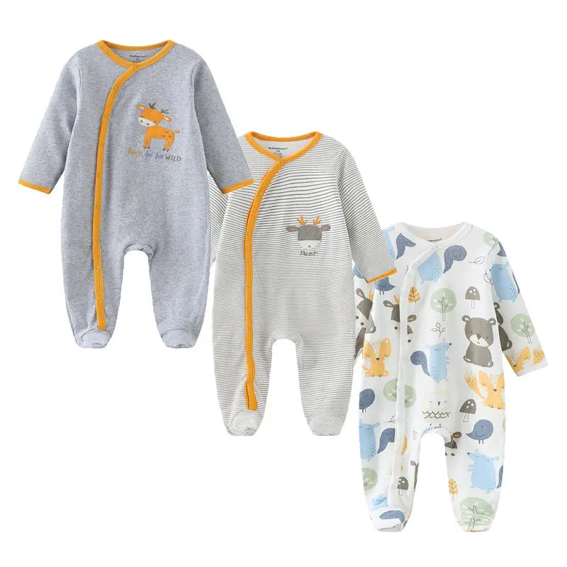 Three cozy newborn baby cotton rompers in autumn colors from Baby Bubble, displayed laid out on a soft surface.