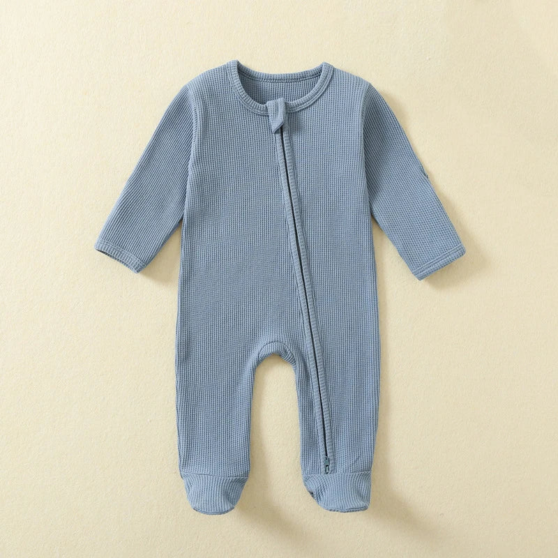 Baby Bubble organic cotton baby romper in waffle fabric, long-sleeve, zipper footed infant pajamas for boys and girls.